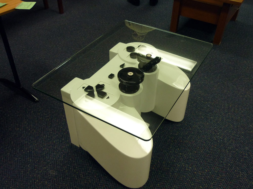A coffee table for Generation Y - made of a Playstation controller